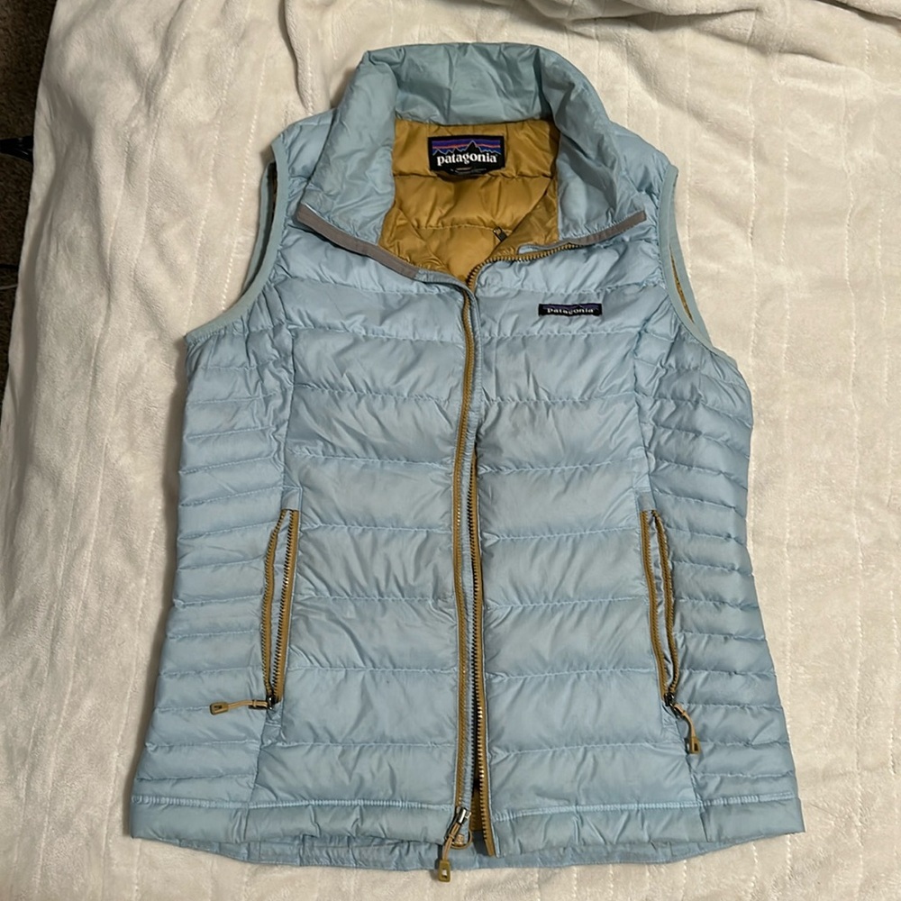 Patagonia women’s small light blue vest.